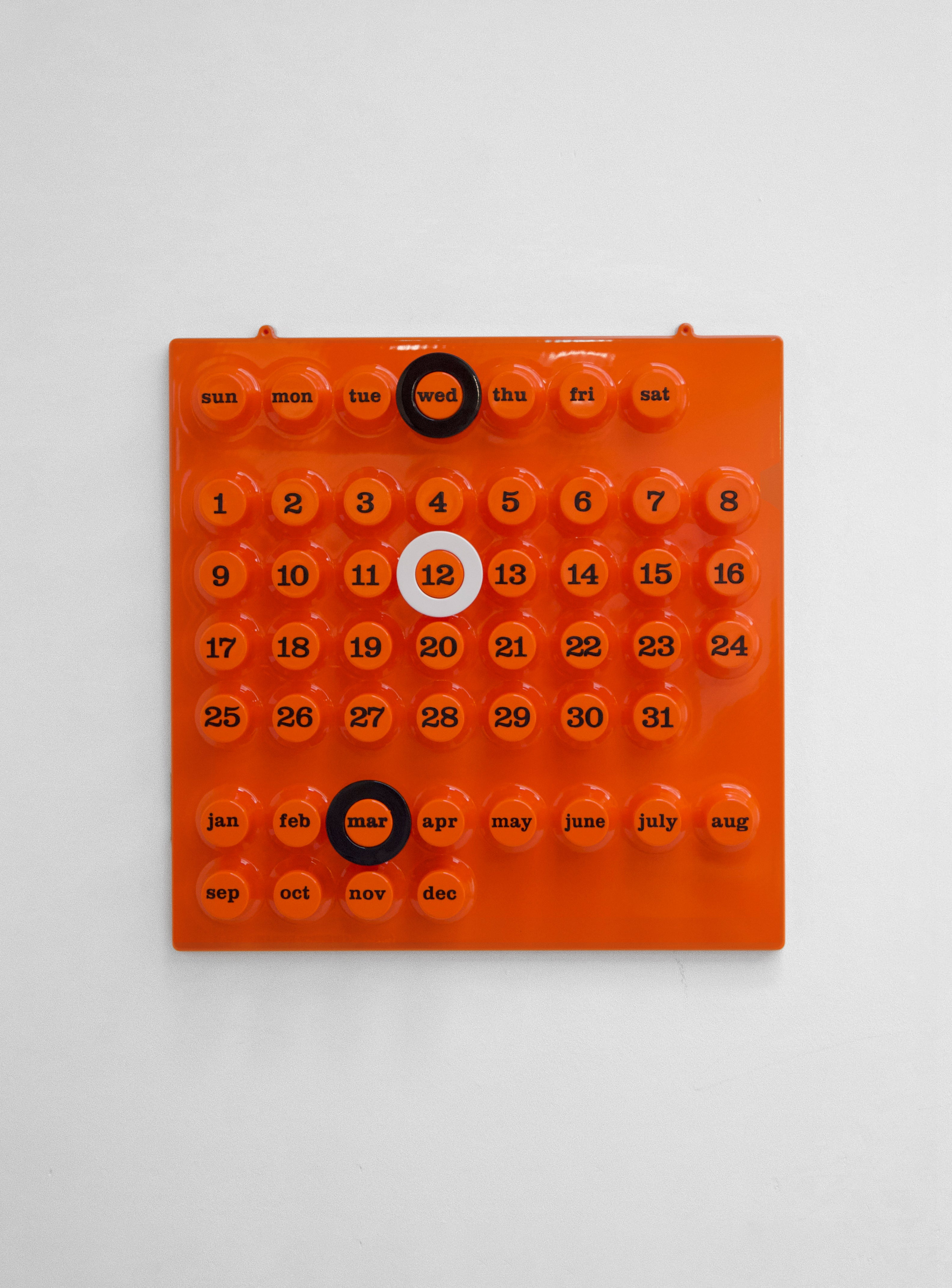 Ring-A-Date Perpetual Calendar by Giorgio Della Beffa (Orange