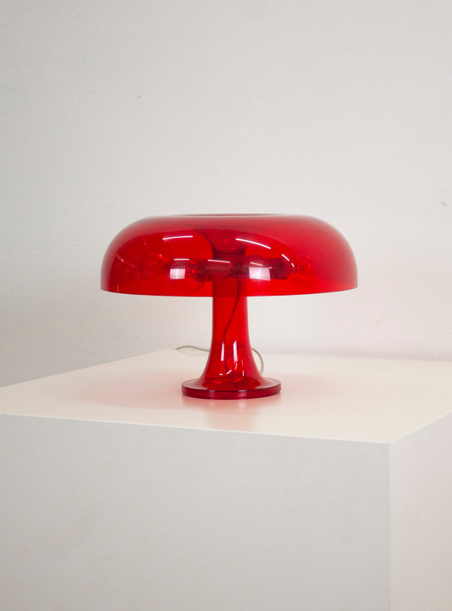 Artemide Nessino Desk Lamp by Giancarlo Mattioli (Translucent Red)