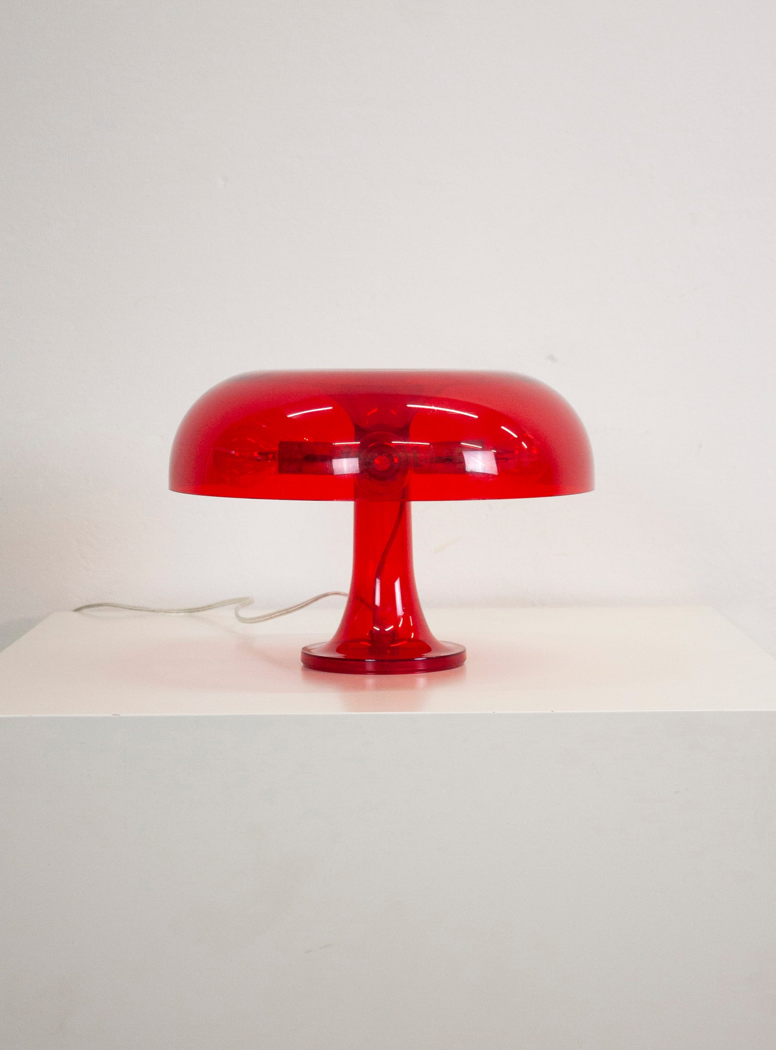 Artemide Nessino Desk Lamp by Giancarlo Mattioli (Translucent Red)