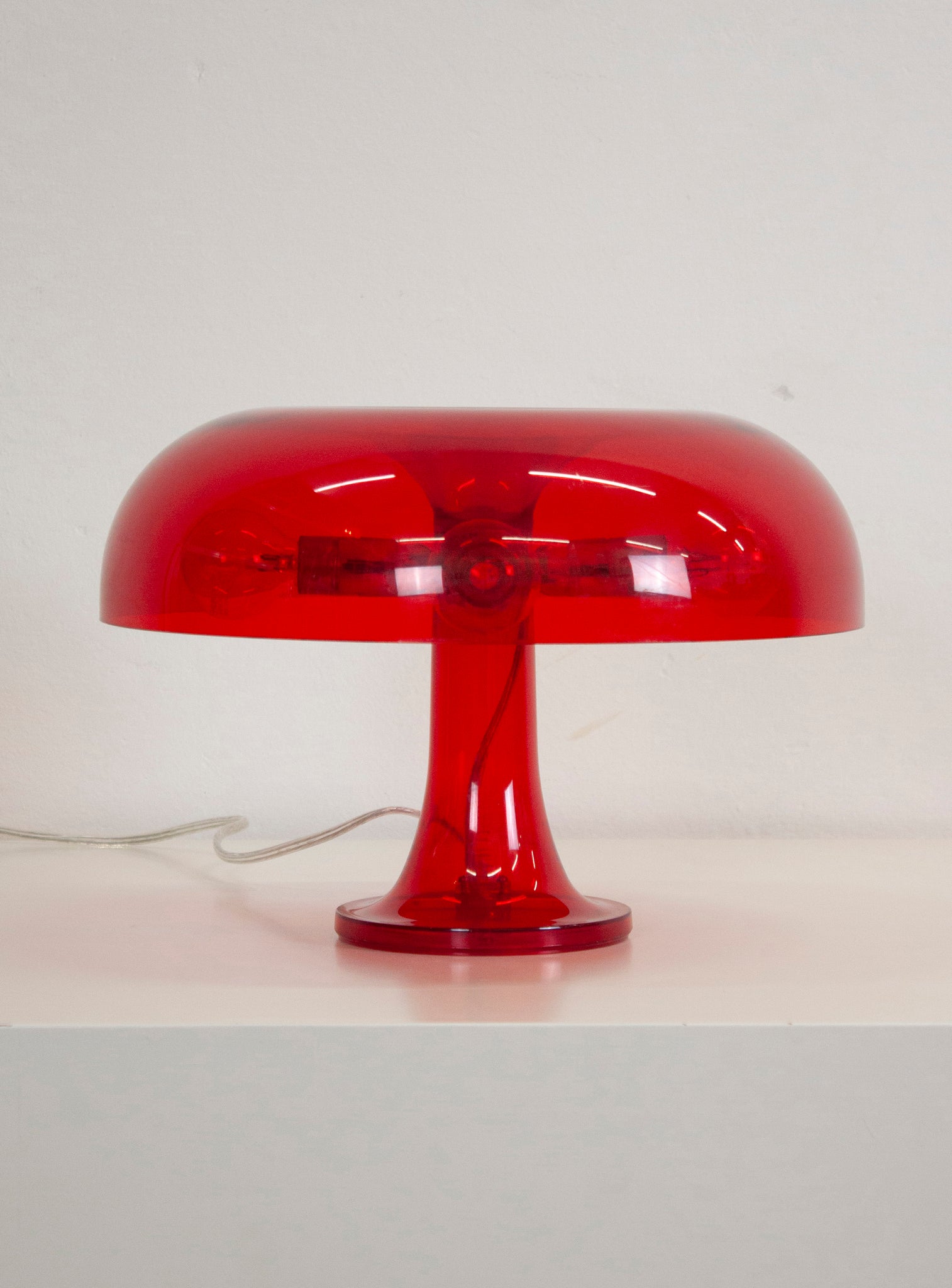 Artemide Nessino Desk Lamp by Giancarlo Mattioli (Translucent Red)