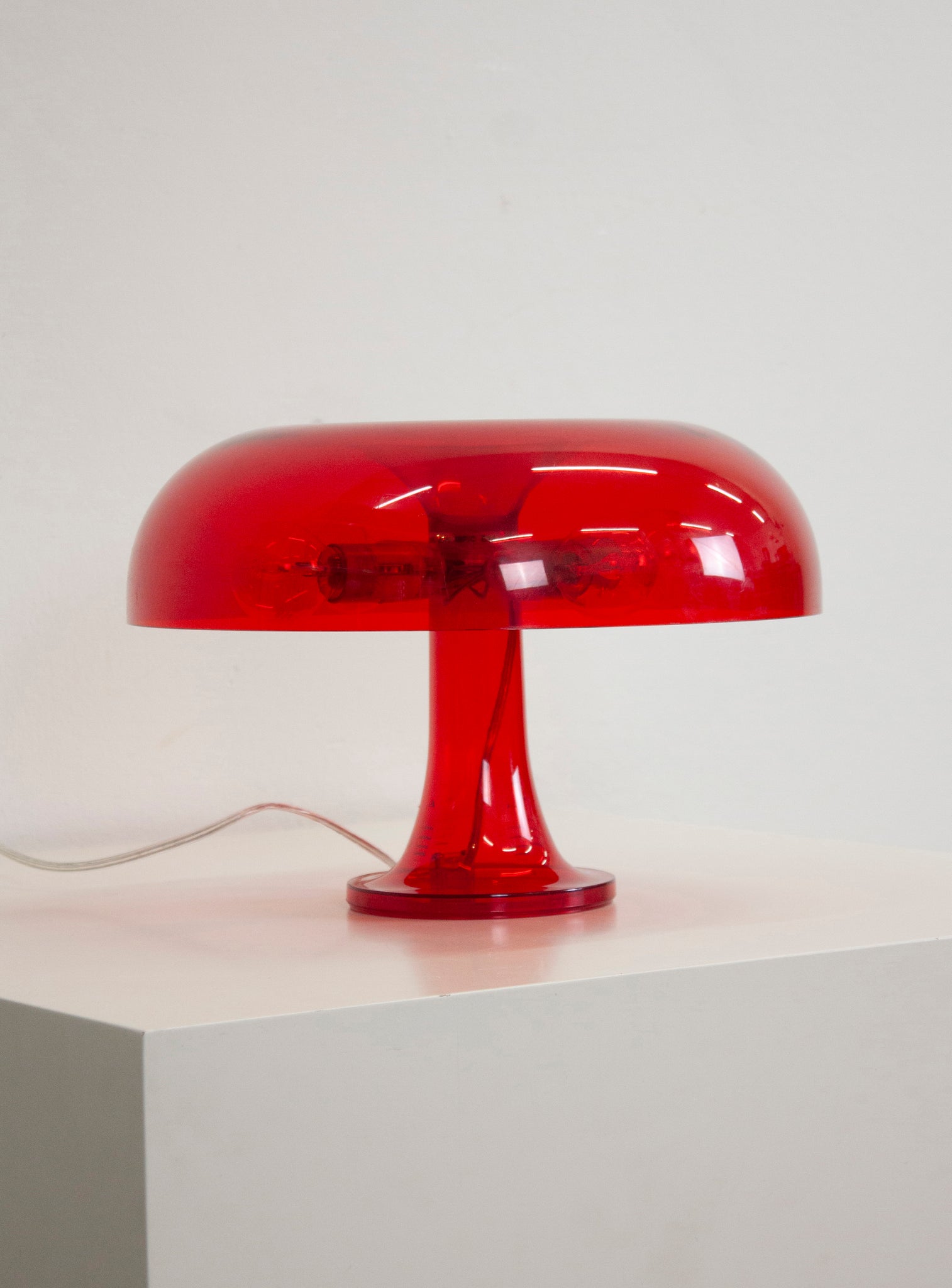 Artemide Nessino Desk Lamp by Giancarlo Mattioli (Translucent Red)