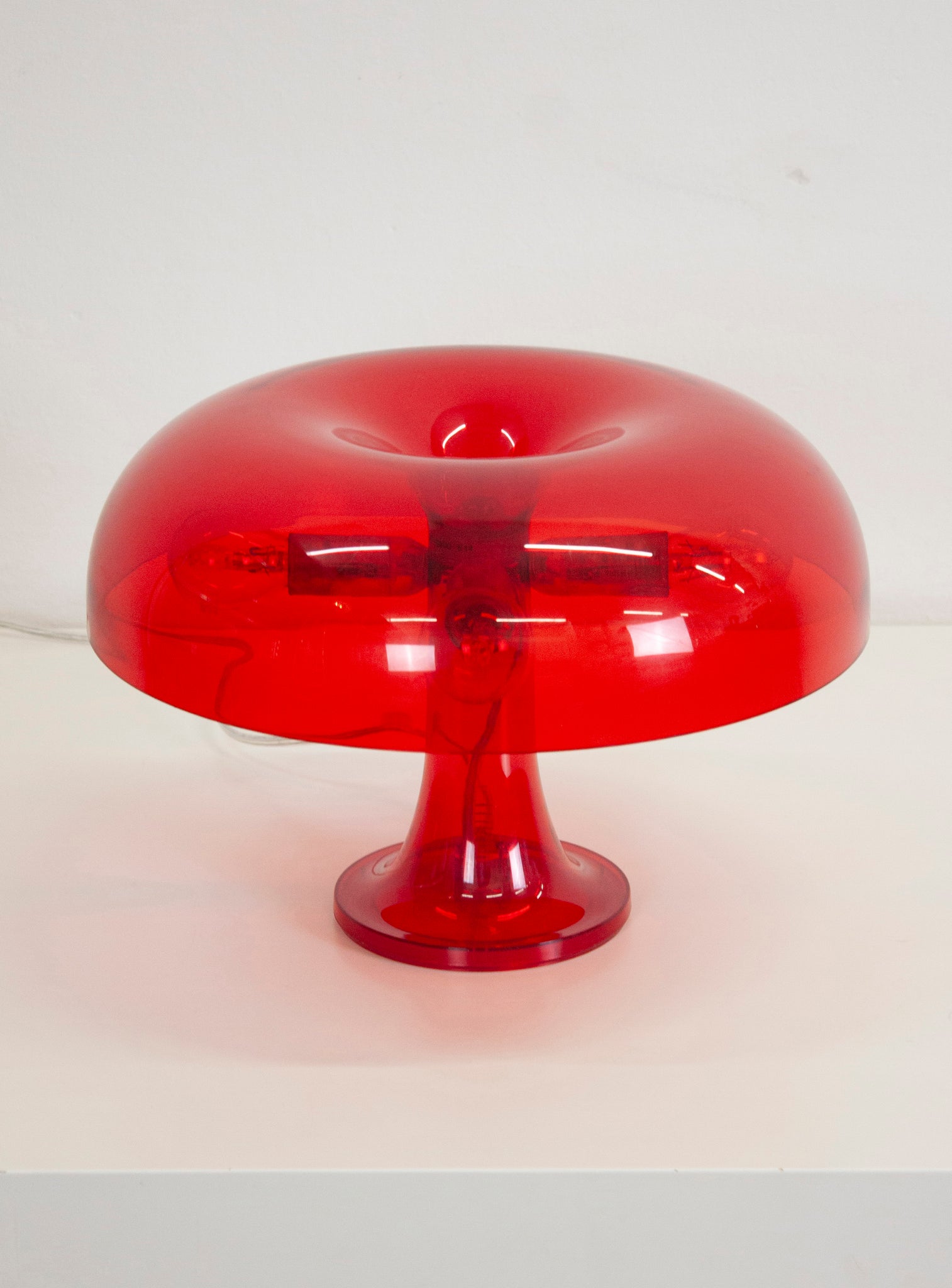 Artemide Nessino Desk Lamp by Giancarlo Mattioli (Translucent Red)