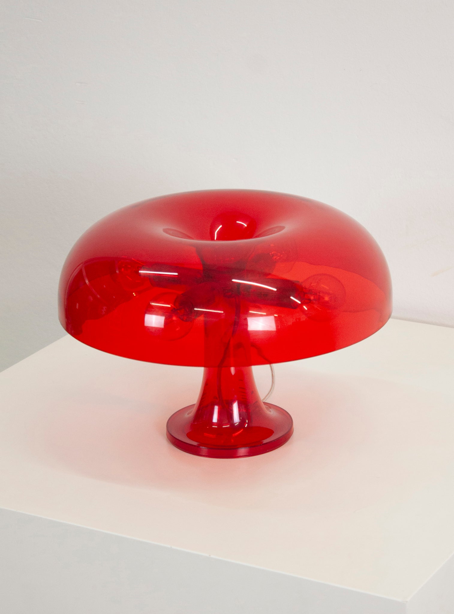 Artemide Nessino Desk Lamp by Giancarlo Mattioli (Translucent Red)