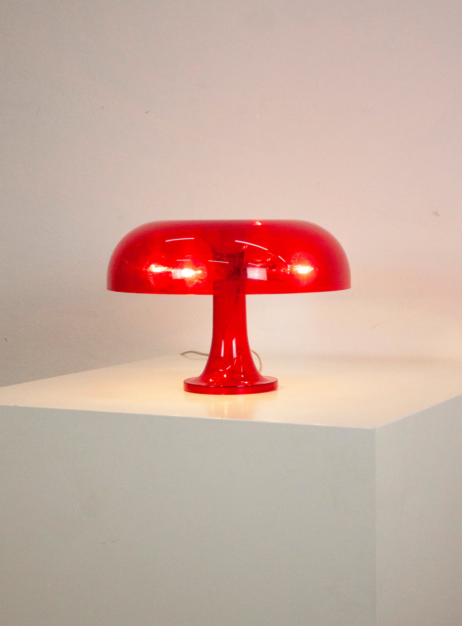 Artemide Nessino Desk Lamp by Giancarlo Mattioli (Translucent Red)