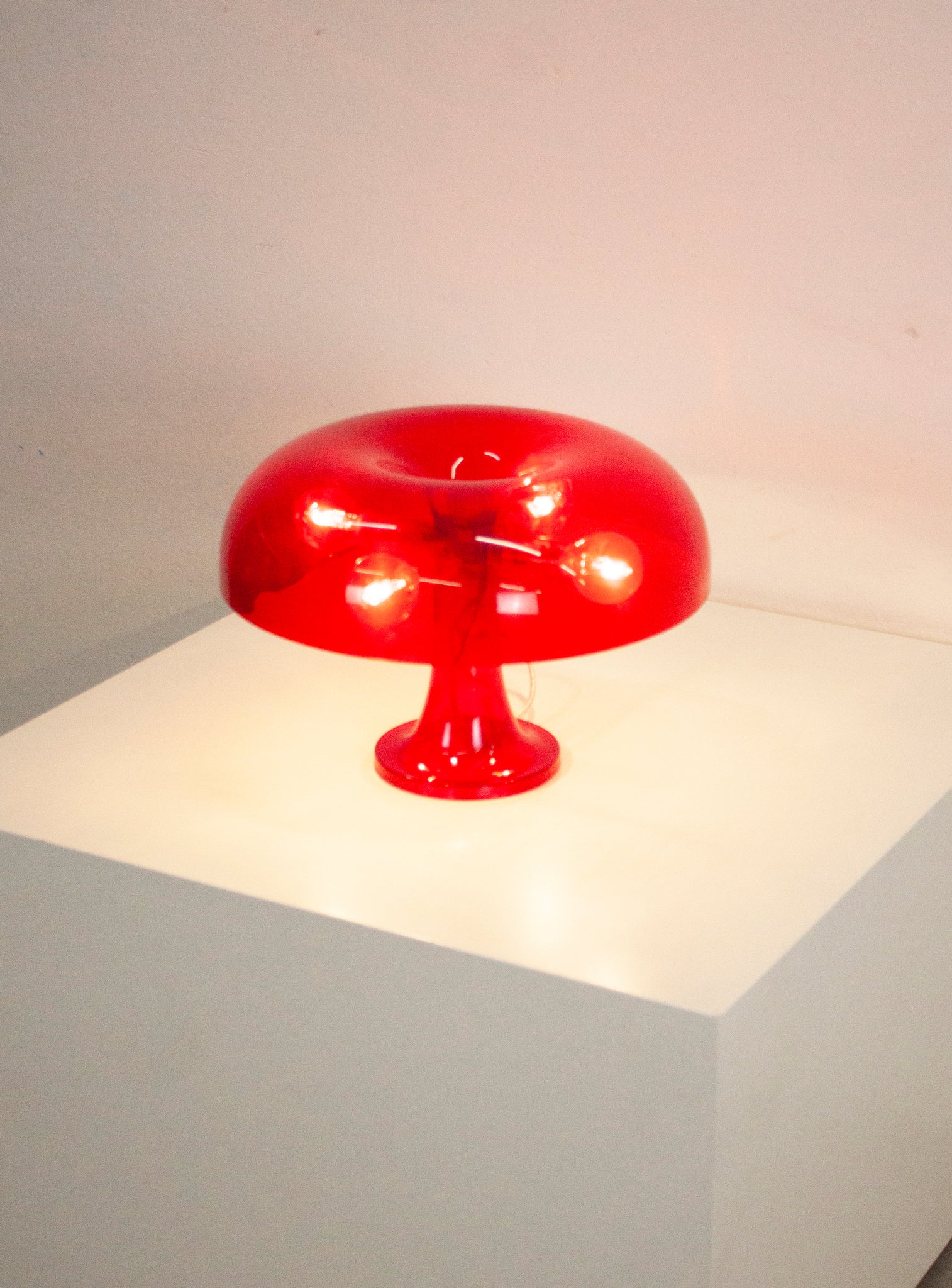 Artemide Nessino Desk Lamp by Giancarlo Mattioli (Translucent Red)