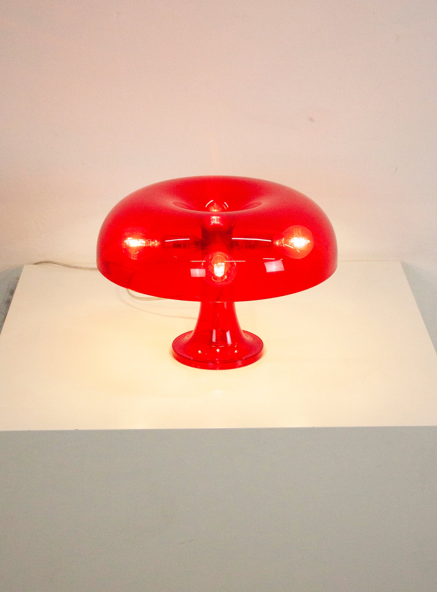 Artemide Nessino Desk Lamp by Giancarlo Mattioli (Translucent Red)