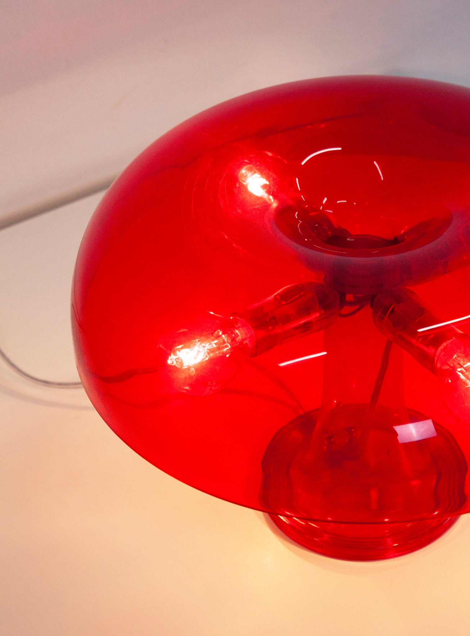 Artemide Nessino Desk Lamp by Giancarlo Mattioli (Translucent Red)