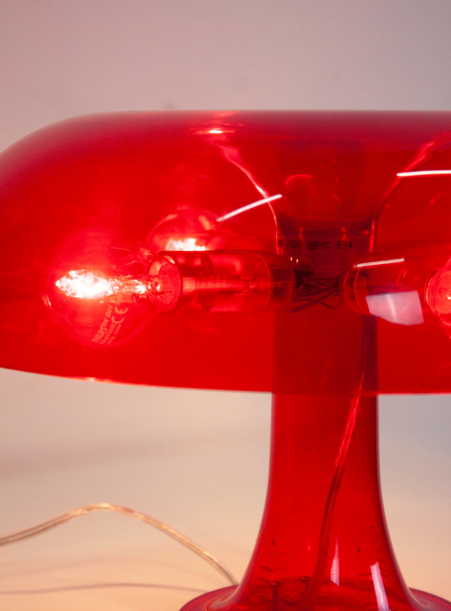 Artemide Nessino Desk Lamp by Giancarlo Mattioli (Translucent Red)