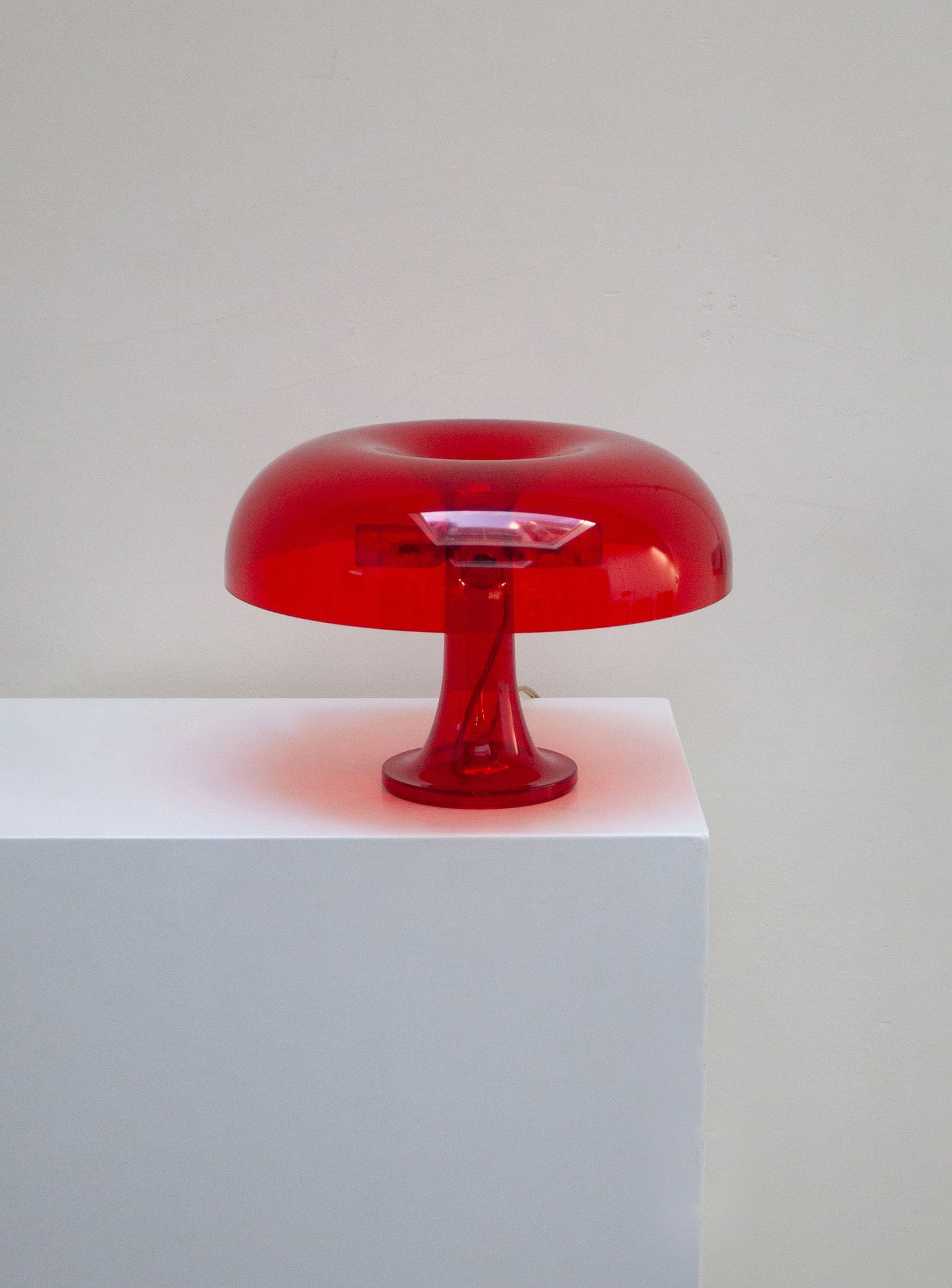 Artemide Nessino Desk Lamp by Giancarlo Mattioli (Translucent Red)