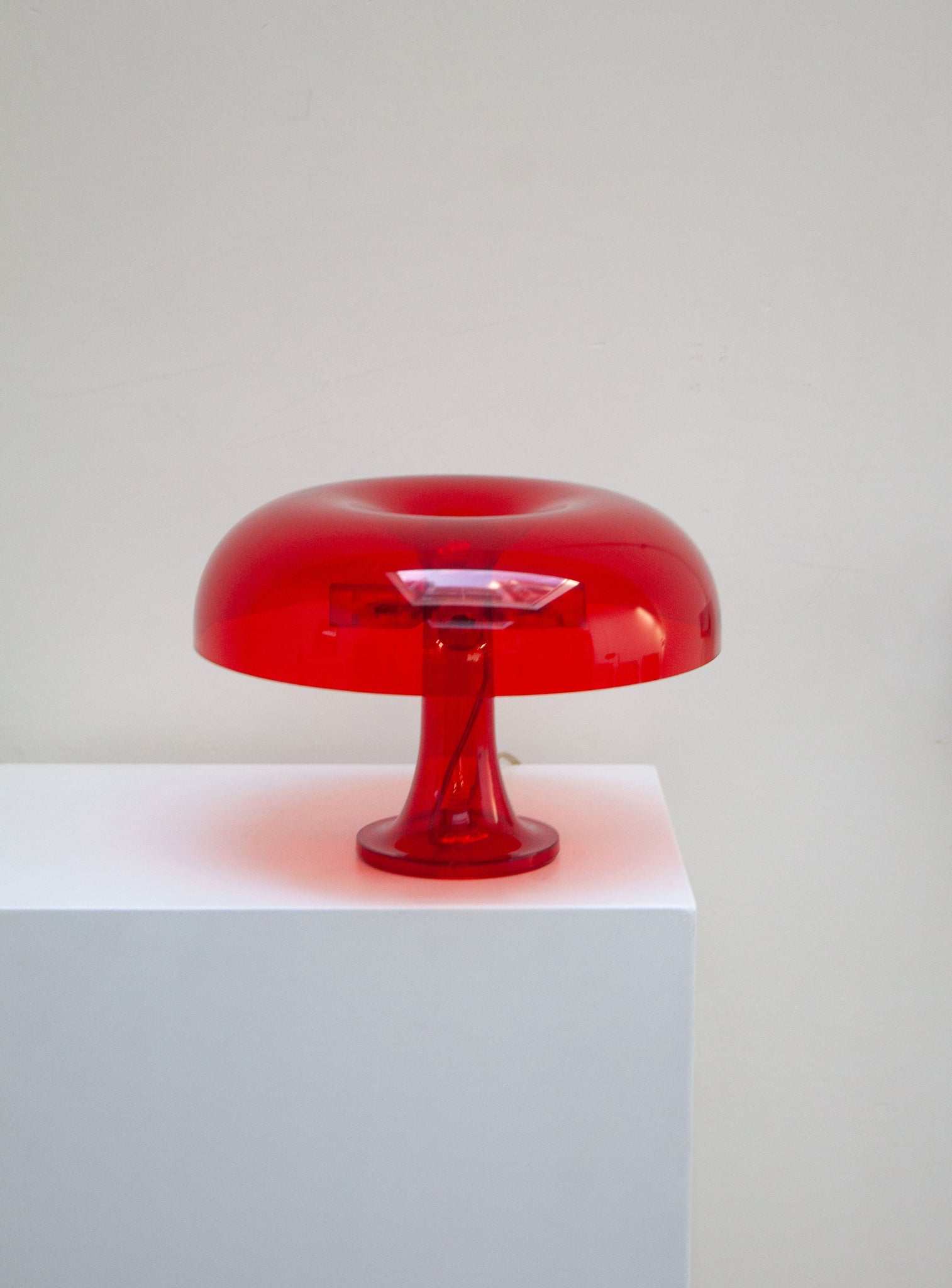 Artemide Nessino Desk Lamp by Giancarlo Mattioli (Translucent Red)