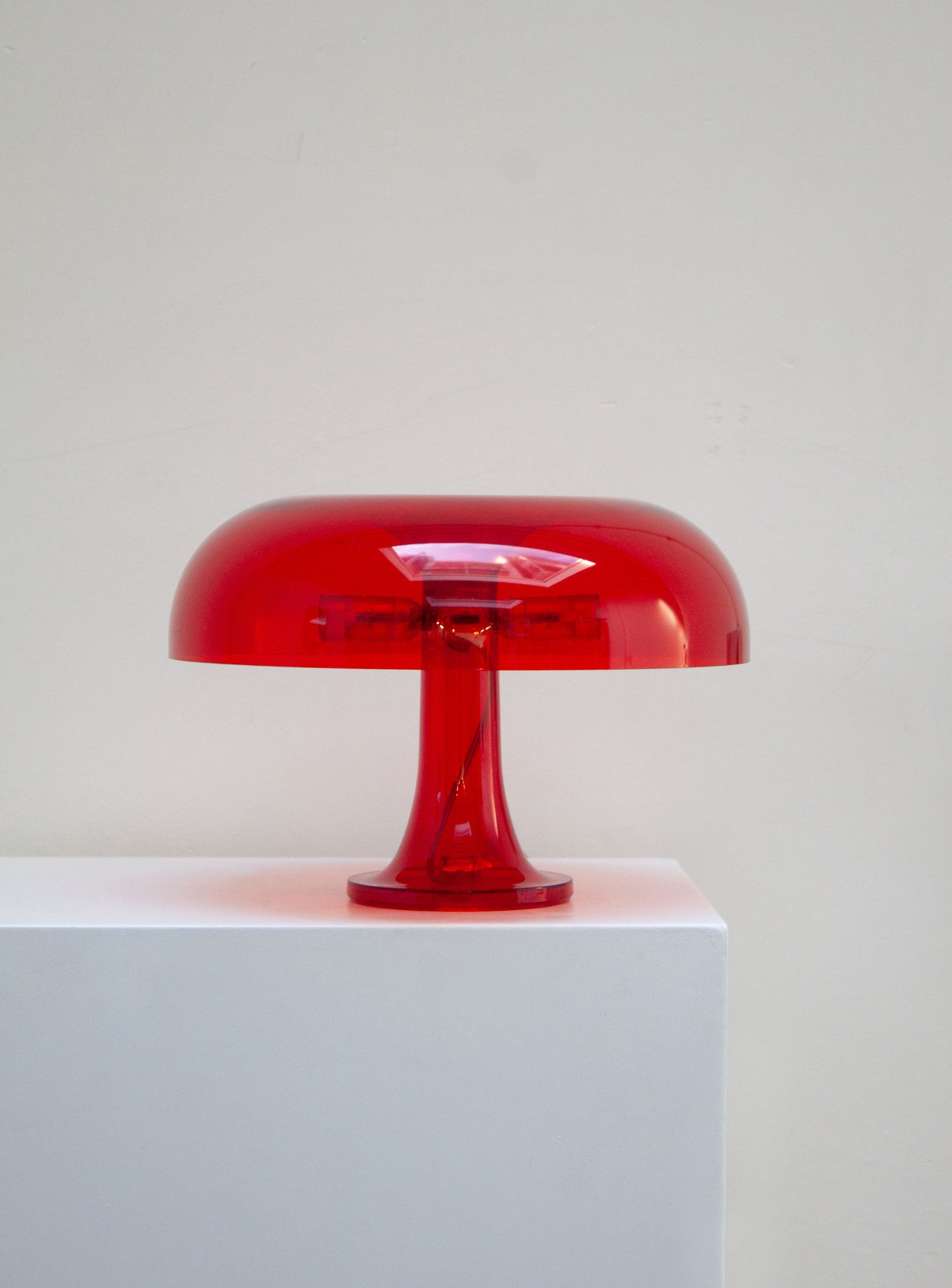 Artemide Nessino Desk Lamp by Giancarlo Mattioli (Translucent Red)