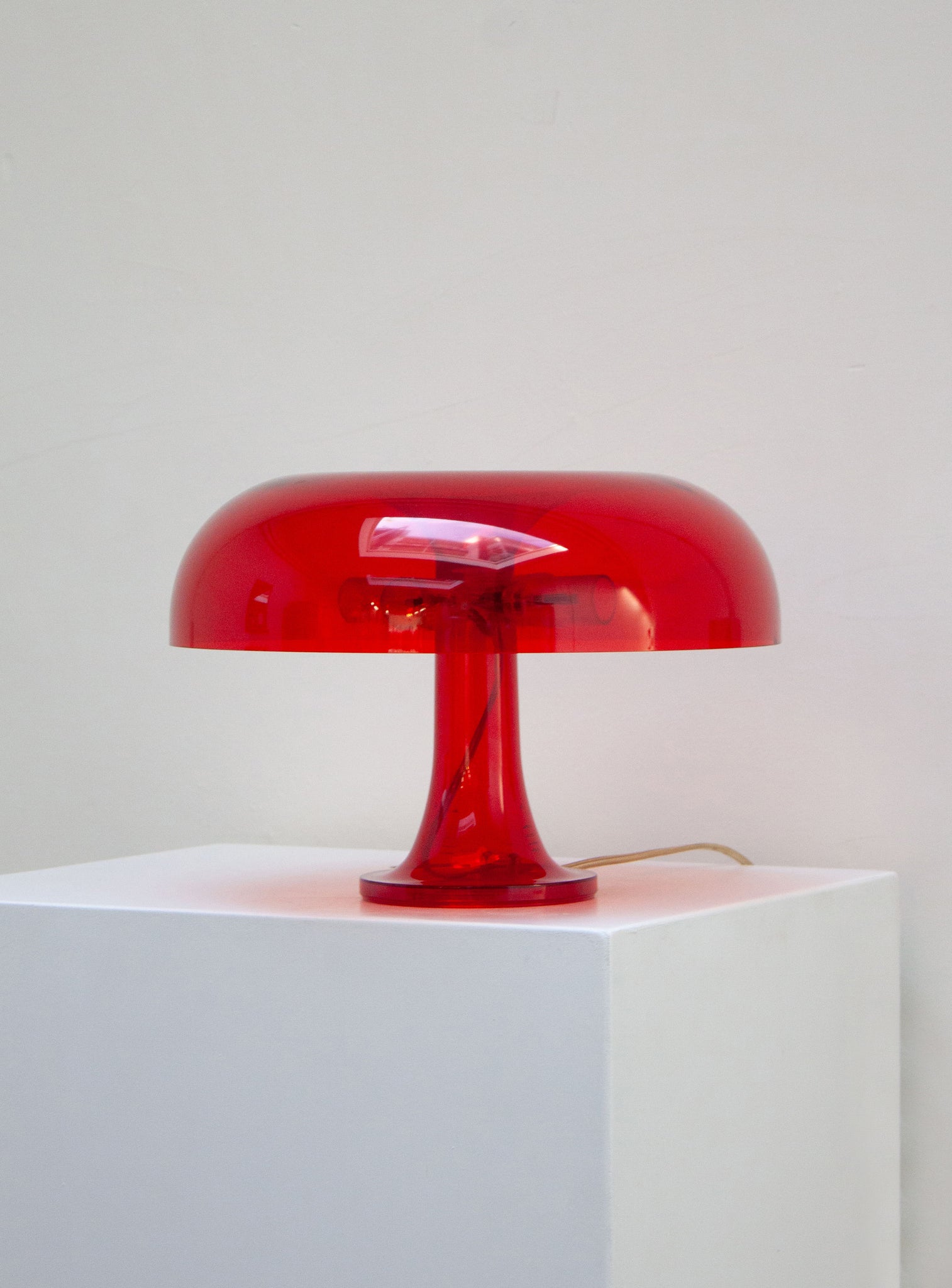 Artemide Nessino Desk Lamp by Giancarlo Mattioli (Translucent Red)