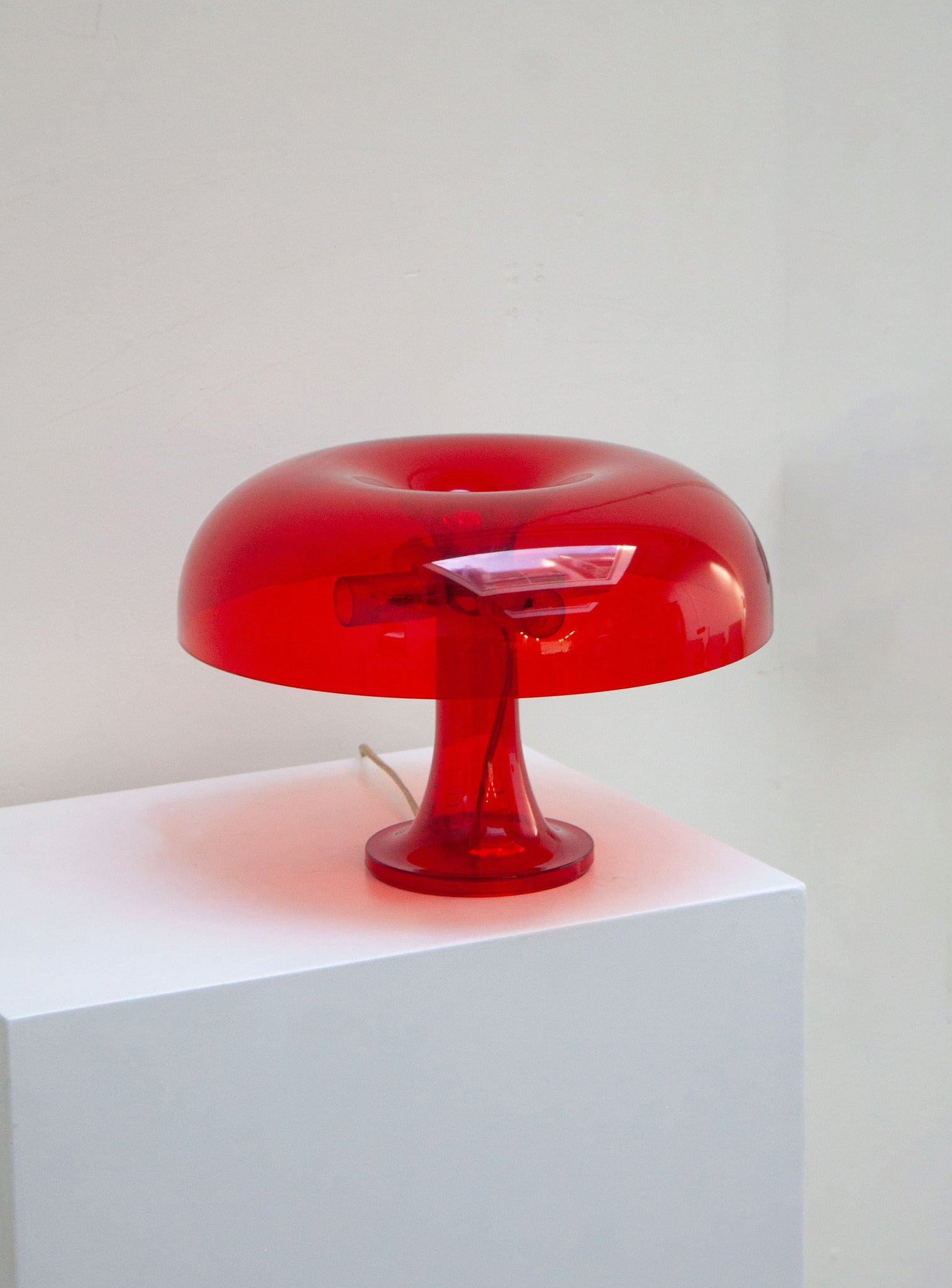 Artemide Nessino Desk Lamp by Giancarlo Mattioli (Translucent Red)