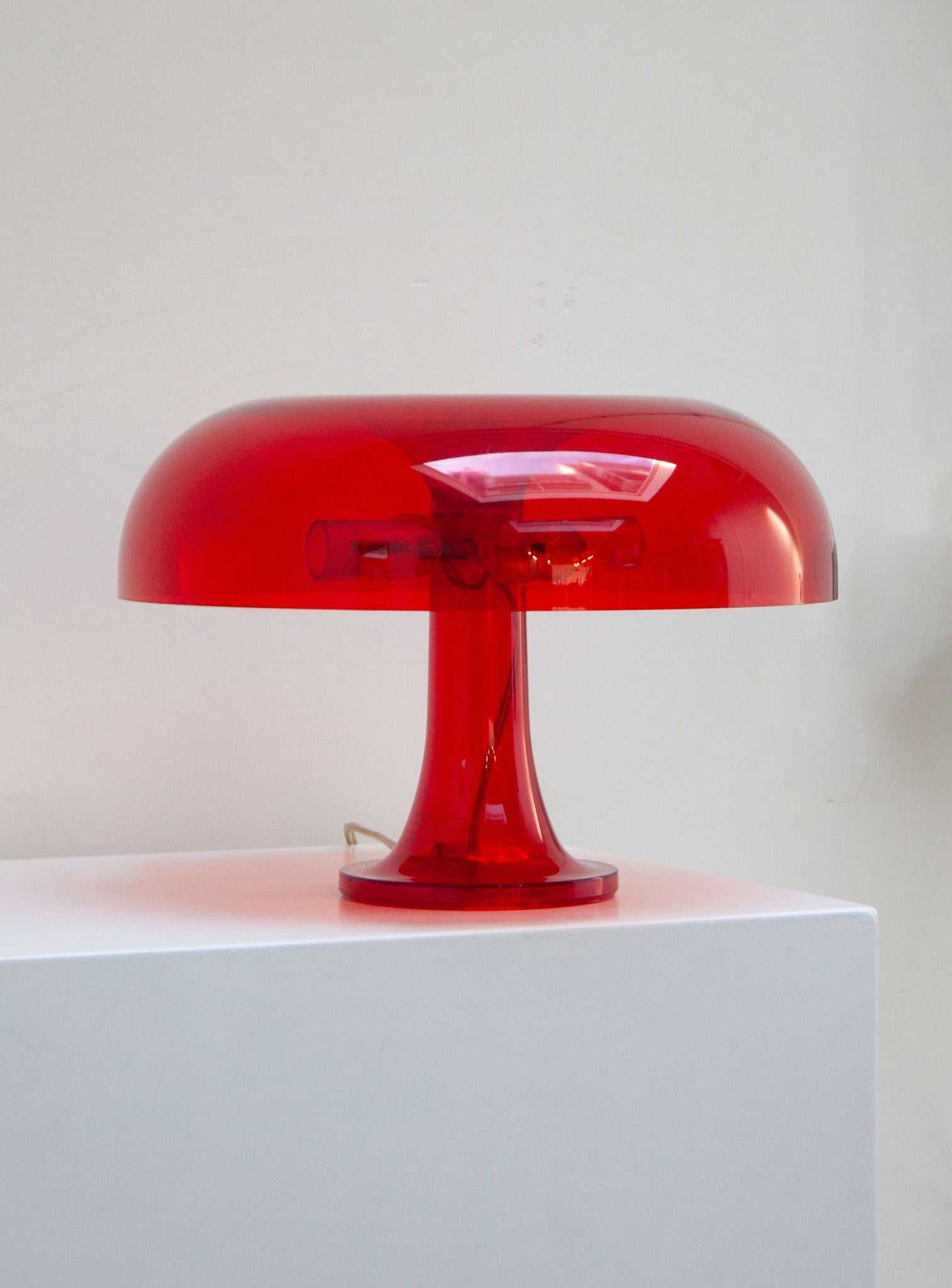Artemide Nessino Desk Lamp by Giancarlo Mattioli (Translucent Red)