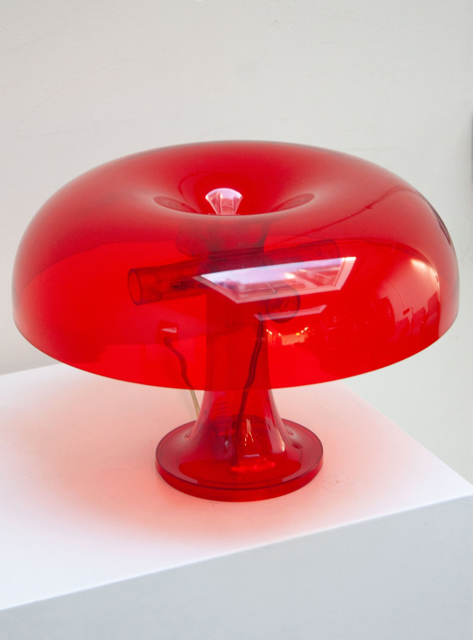 Artemide Nessino Desk Lamp by Giancarlo Mattioli (Translucent Red)