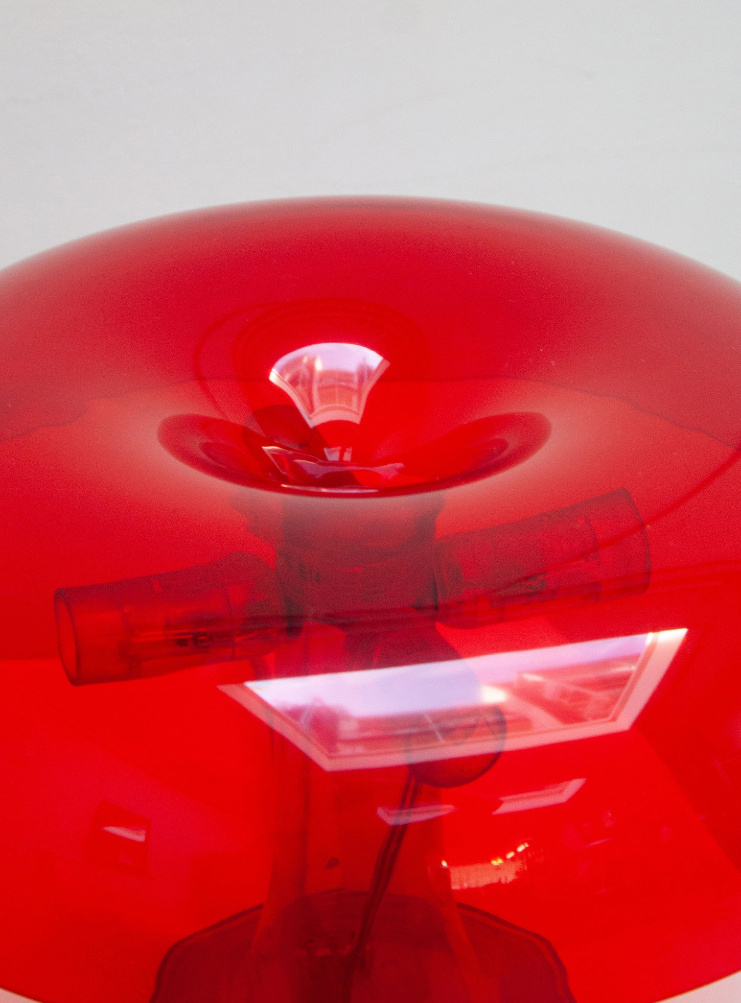 Artemide Nessino Desk Lamp by Giancarlo Mattioli (Translucent Red)