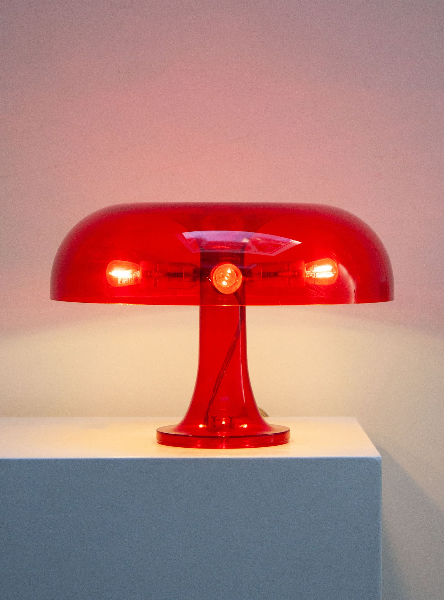 Artemide Nessino Desk Lamp by Giancarlo Mattioli (Translucent Red)
