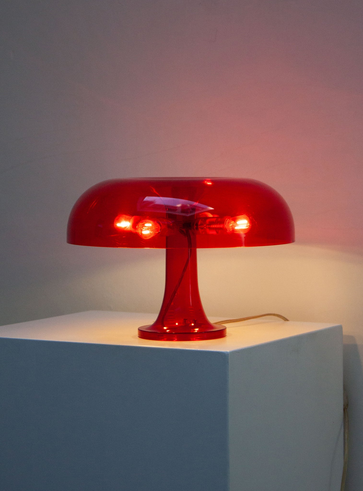 Artemide Nessino Desk Lamp by Giancarlo Mattioli (Translucent Red)