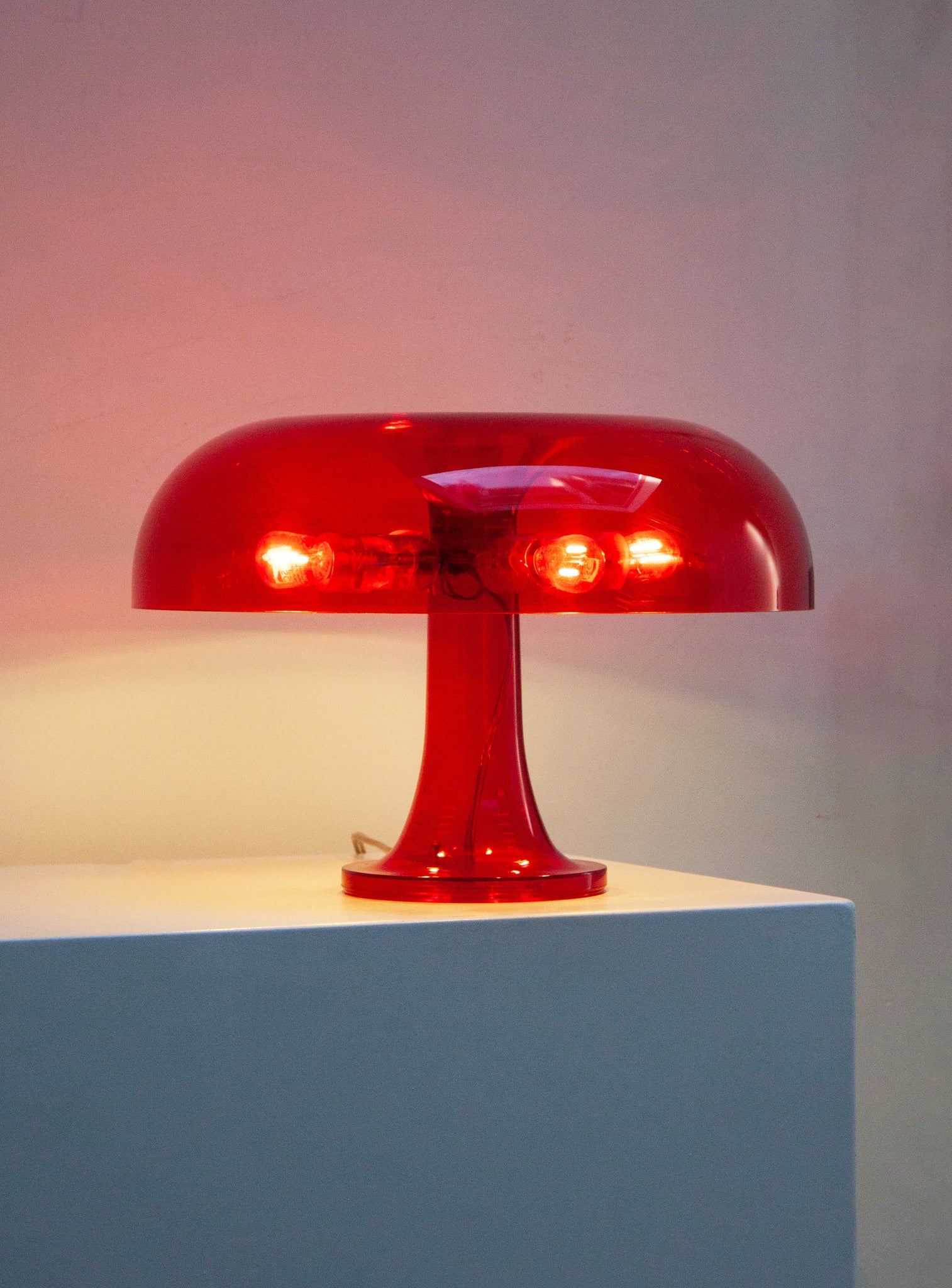 Artemide Nessino Desk Lamp by Giancarlo Mattioli (Translucent Red)