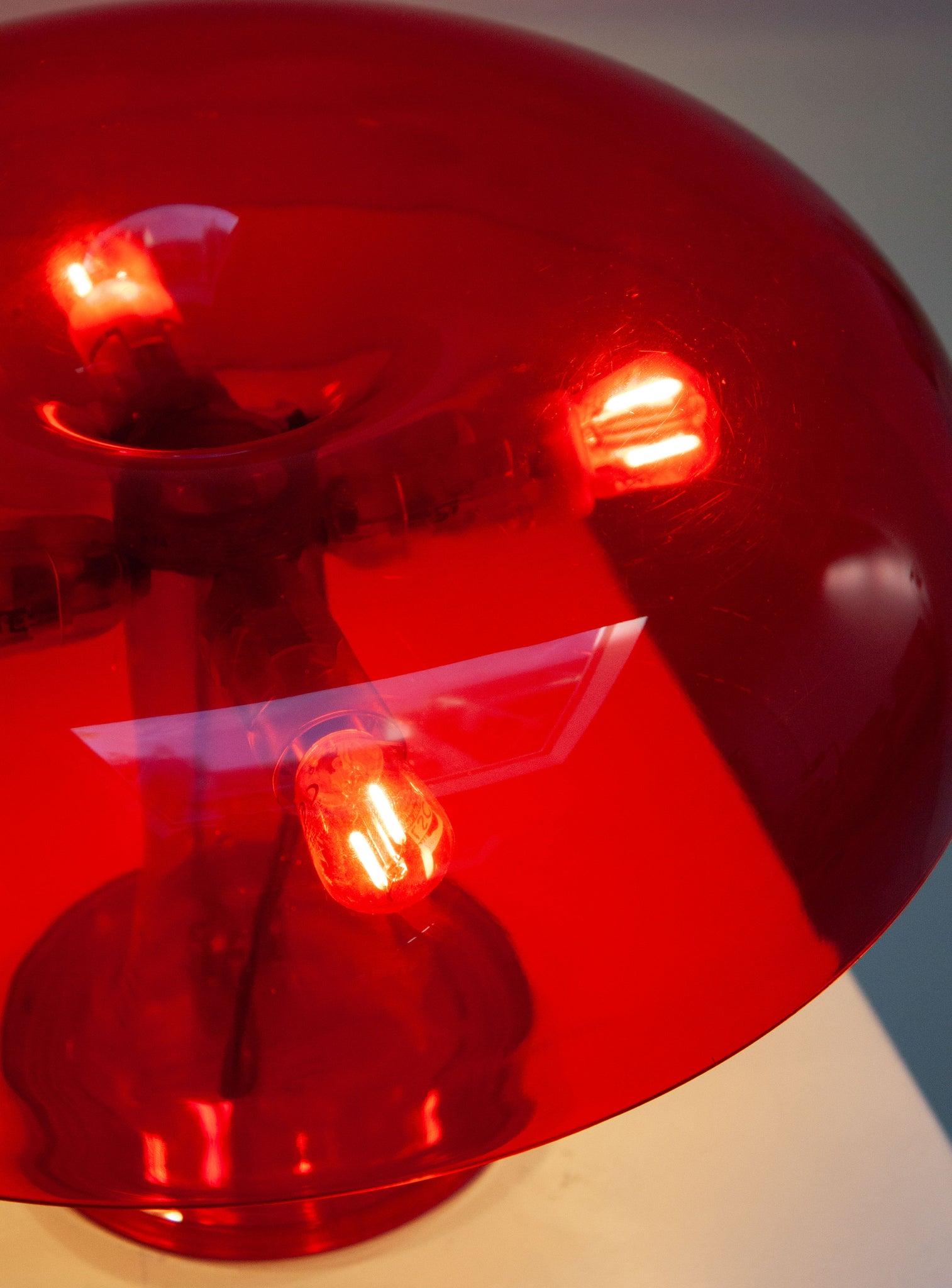Artemide Nessino Desk Lamp by Giancarlo Mattioli (Translucent Red)