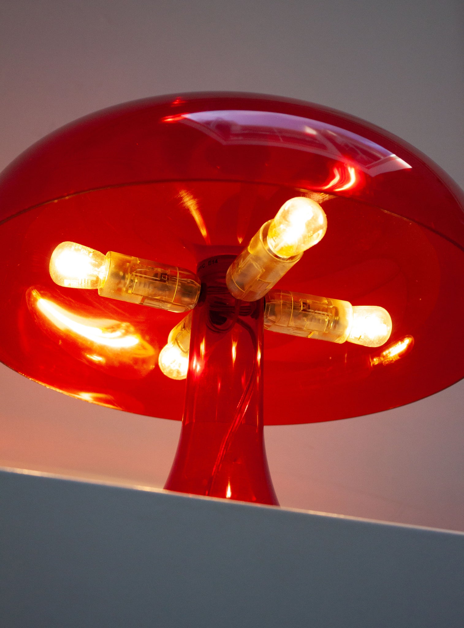 Artemide Nessino Desk Lamp by Giancarlo Mattioli (Translucent Red)
