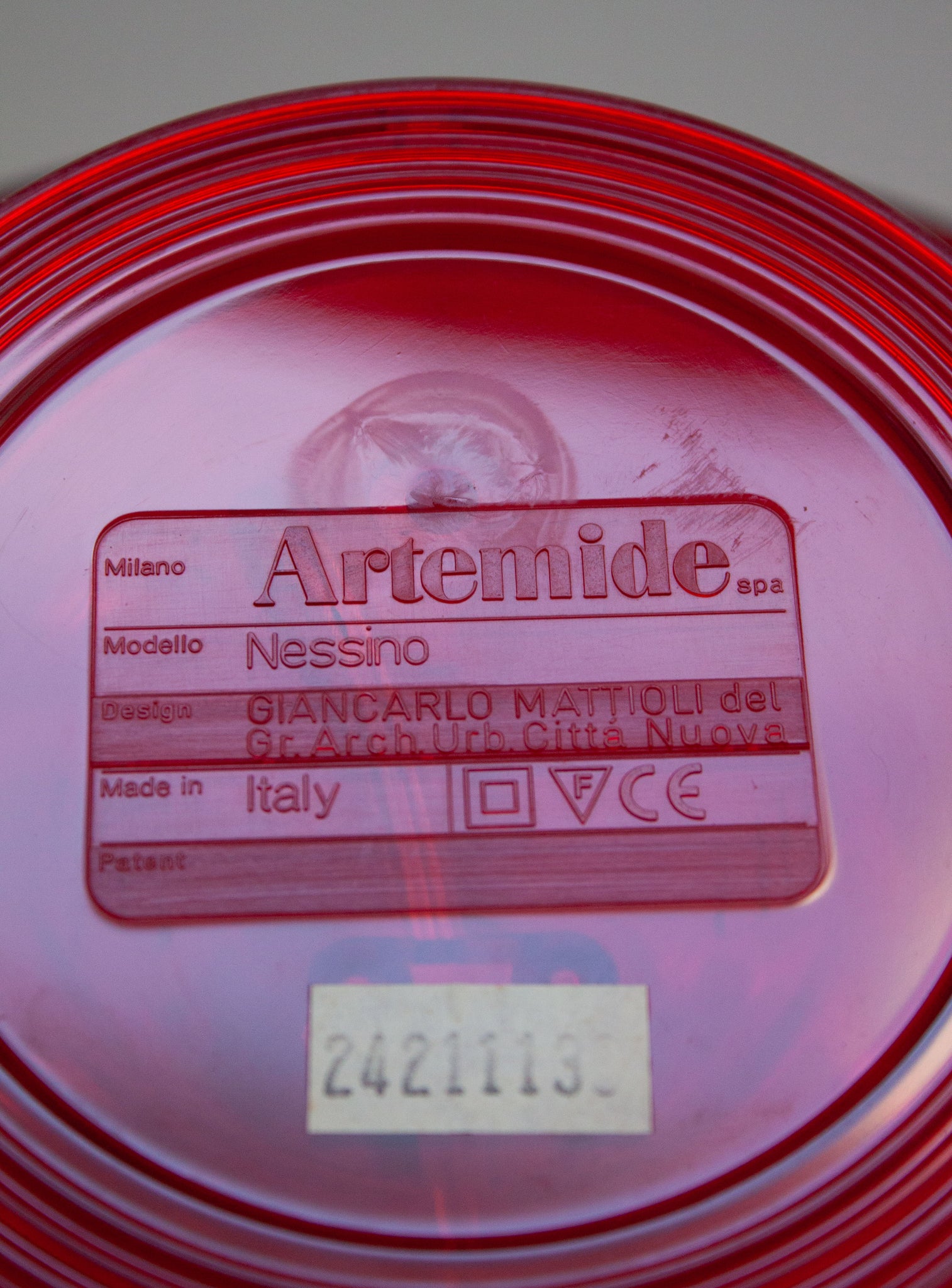 Artemide Nessino Desk Lamp by Giancarlo Mattioli (Translucent Red)