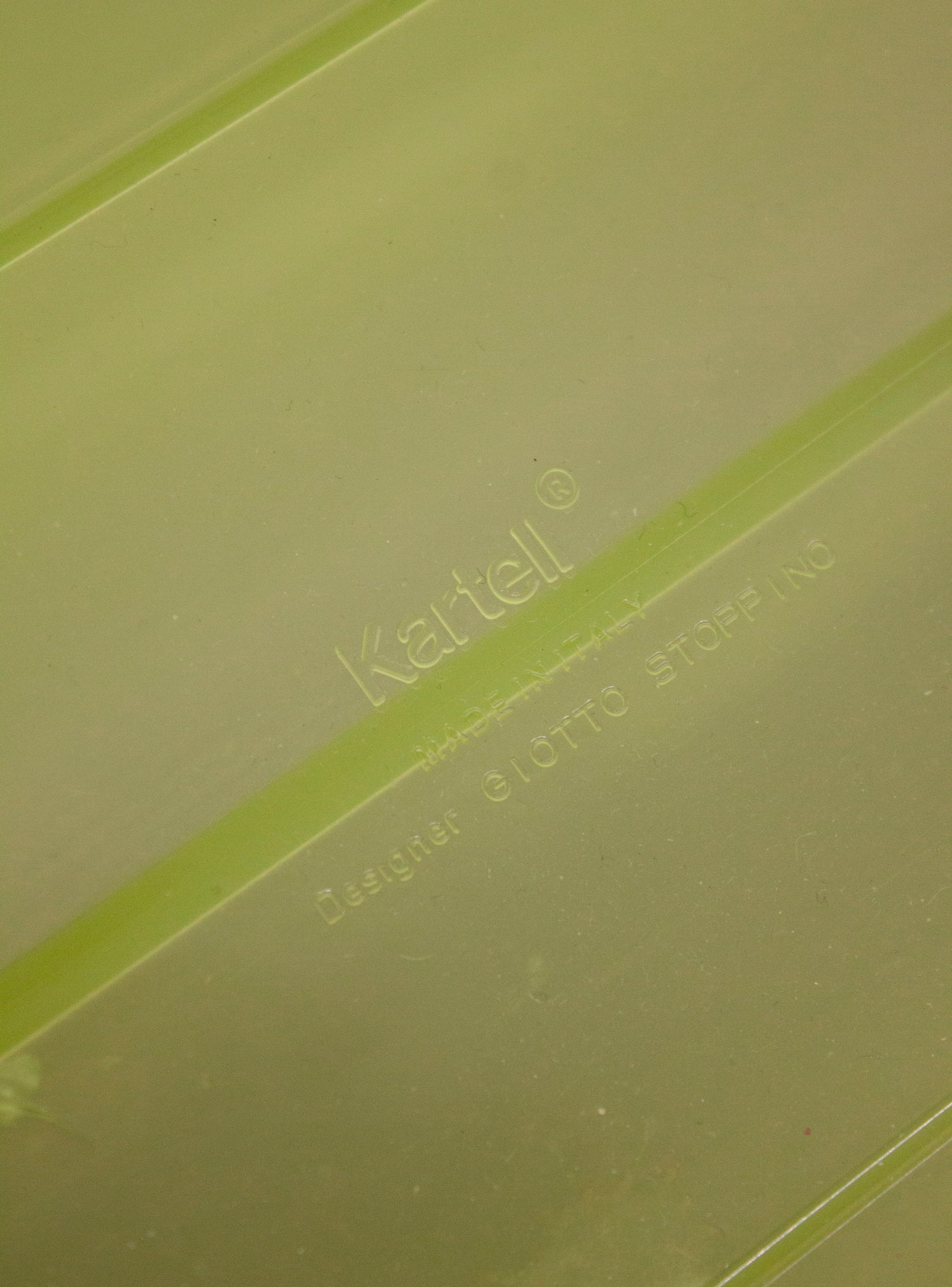 Kartell Magazine Rack by Giotto Stoppino (Neon Green)