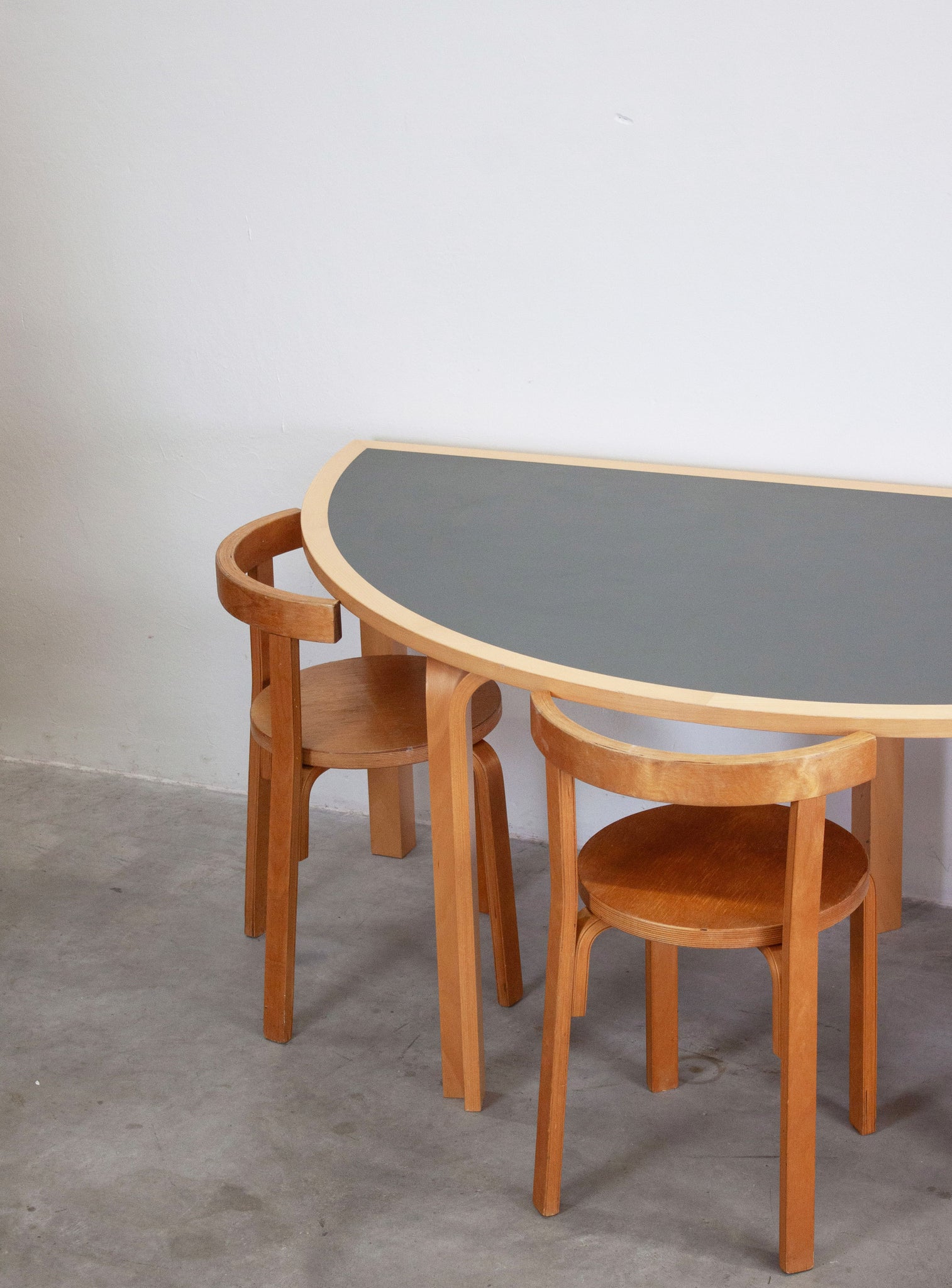 Magnus Olesen Half Round Dining Table by Rud Thygesen & Johnny Sørensen (Dark Grey)