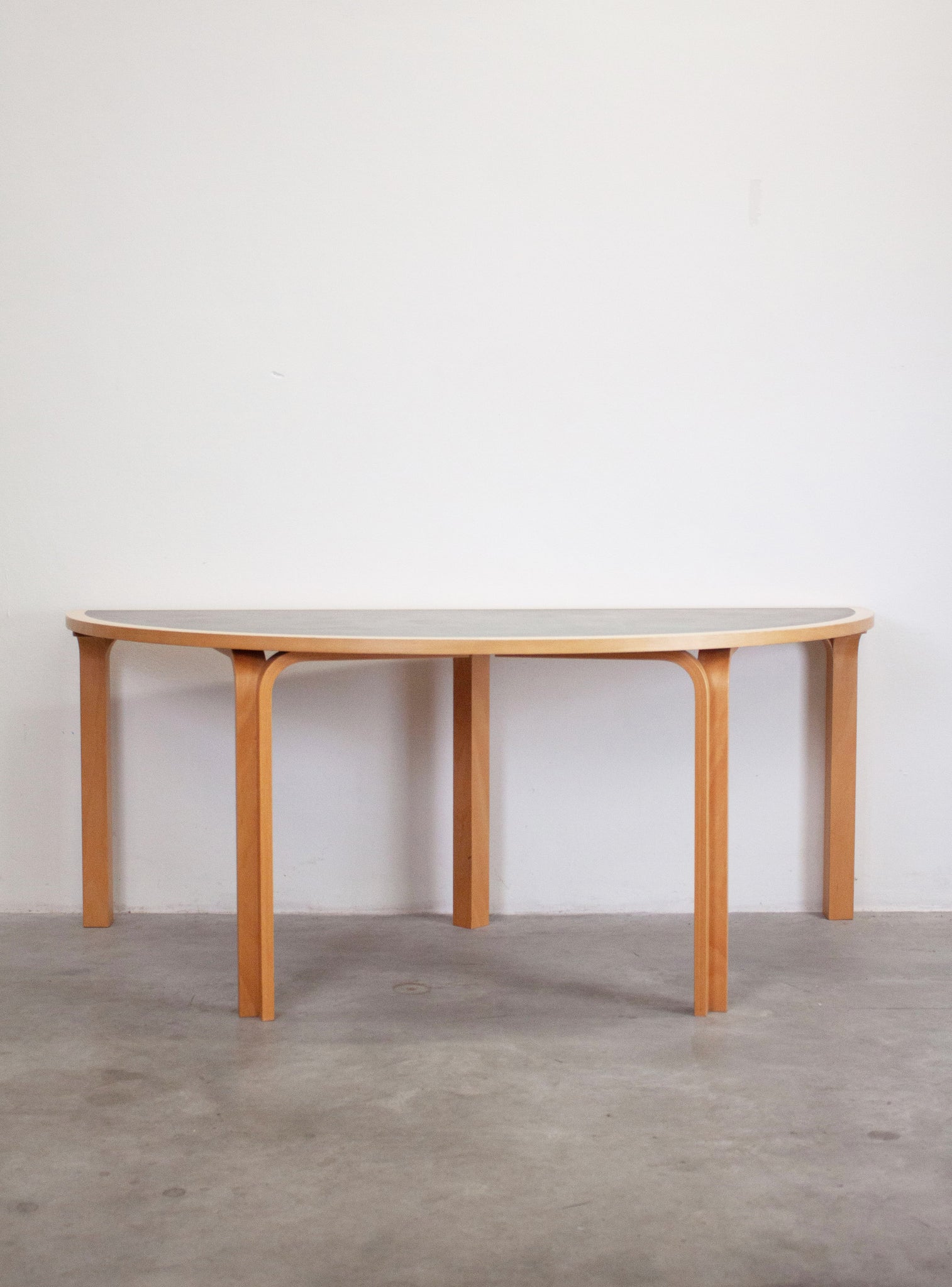 Magnus Olesen Half Round Dining Table by Rud Thygesen & Johnny Sørensen (Dark Grey)