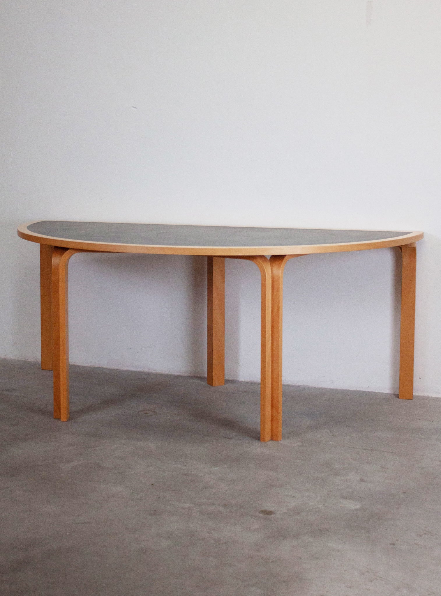 Magnus Olesen Half Round Dining Table by Rud Thygesen & Johnny Sørensen (Dark Grey)