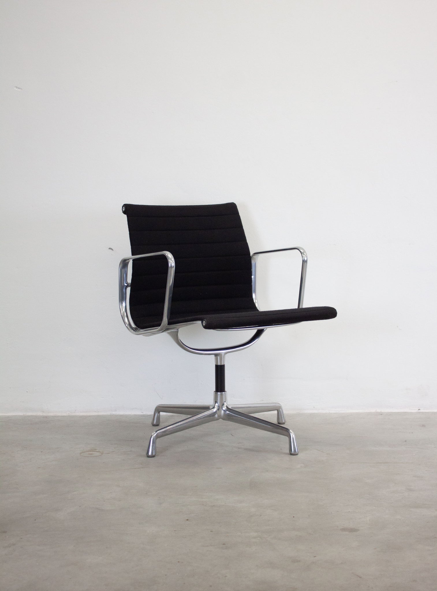 Vitra EA108 Aluminium Chairs by Charles & Ray Eames (Black)