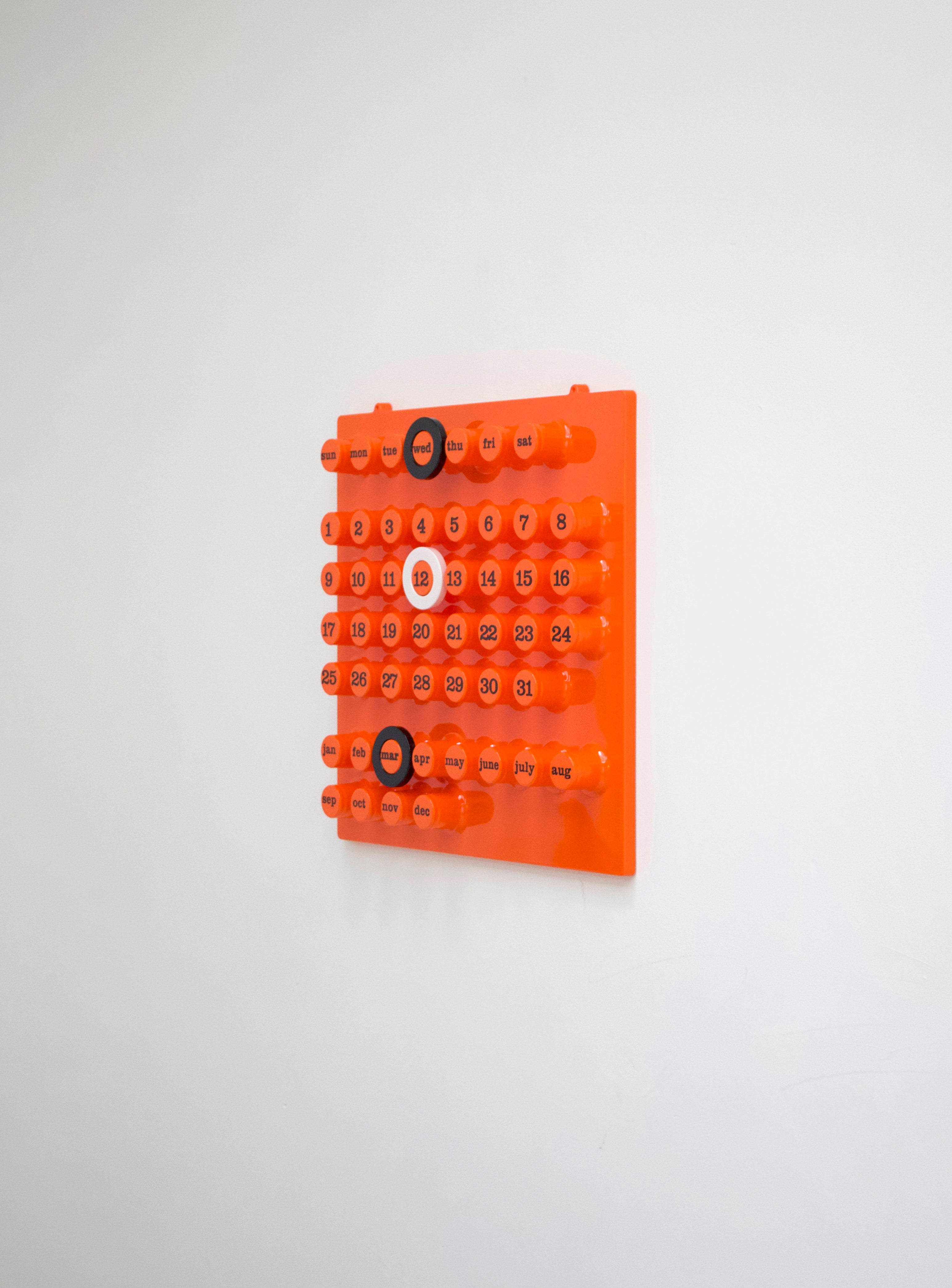 Ring-A-Date Perpetual Calendar by Giorgio Della Beffa (Orange