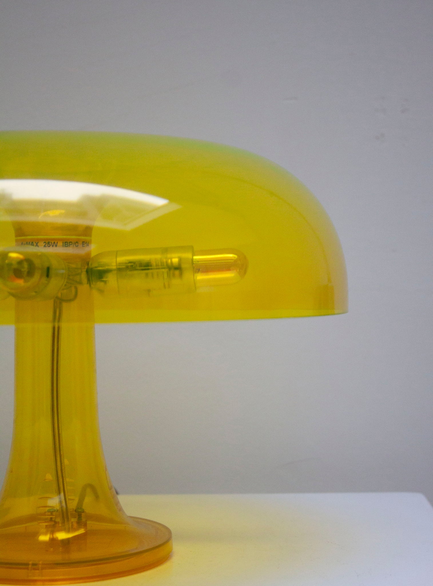 Artemide Nessino Desk Lamp by Giancarlo Mattioli (Translucent Yellow)