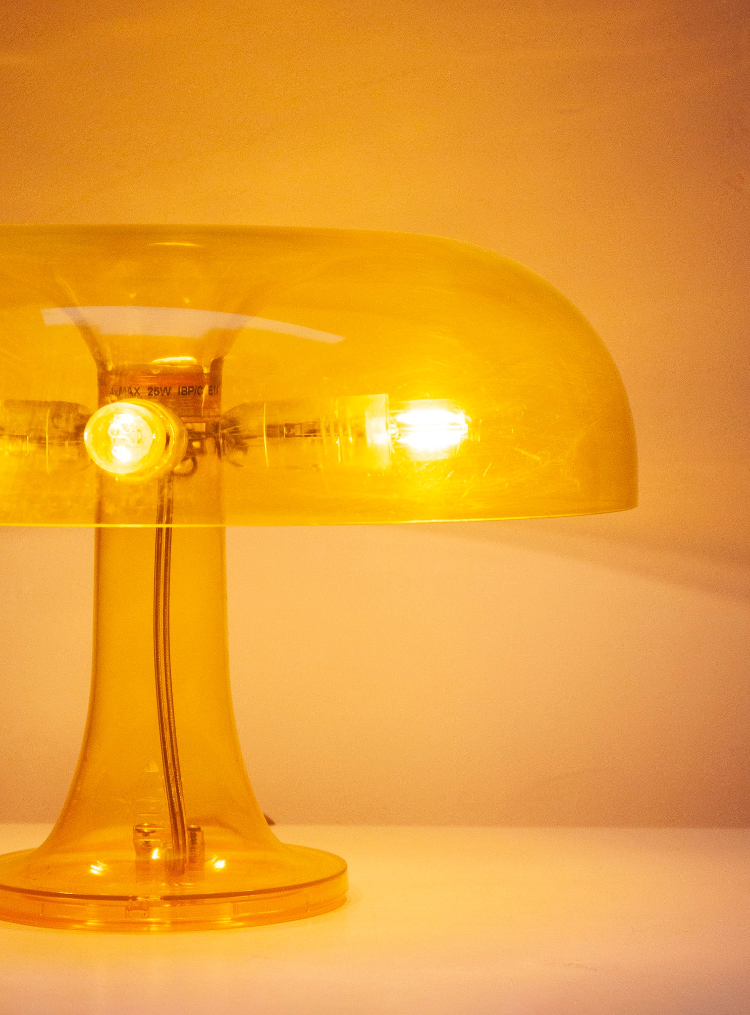 Artemide Nessino Desk Lamp by Giancarlo Mattioli (Translucent Yellow)