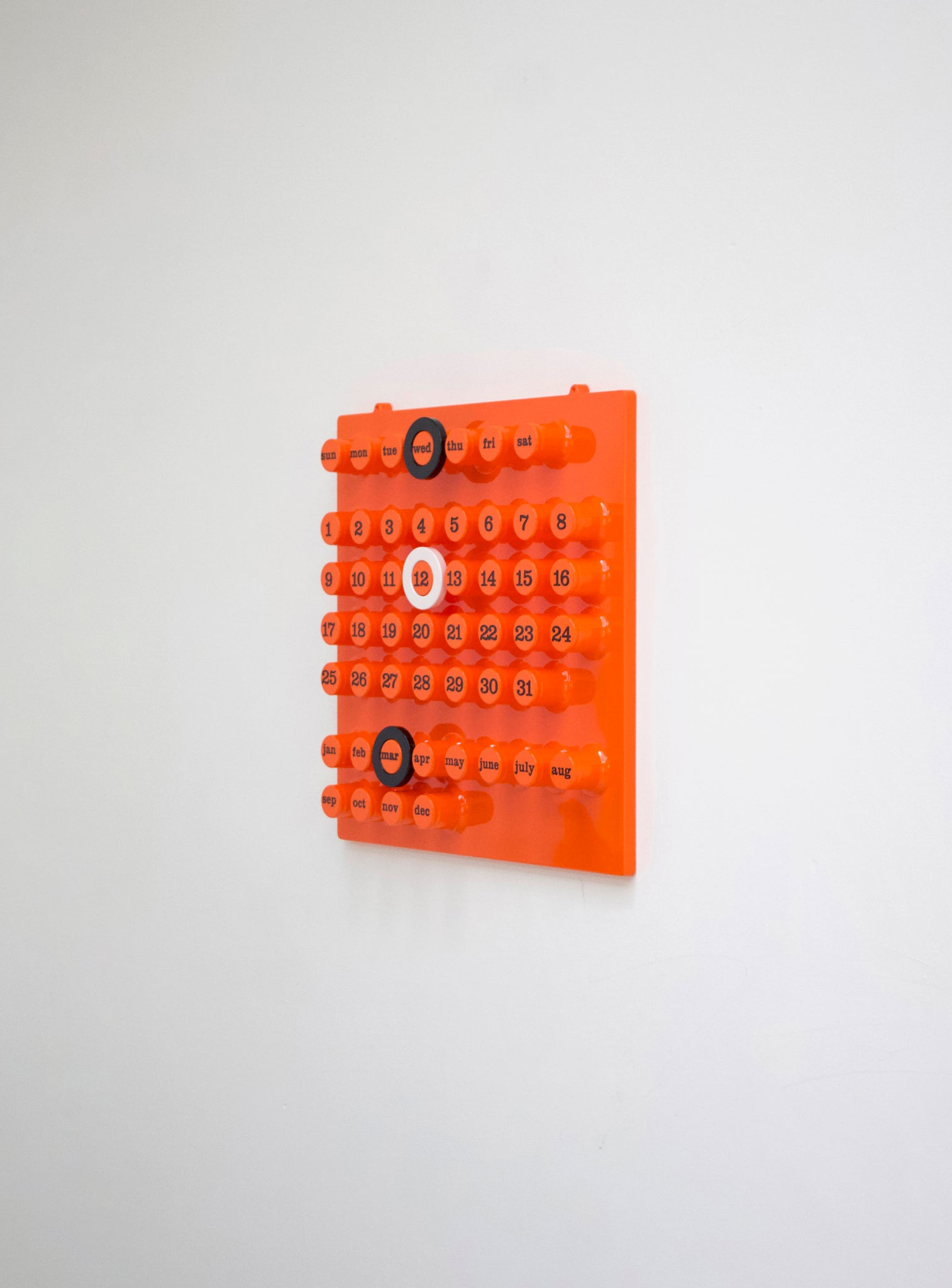 Ring-A-Date Perpetual Calendar by Giorgio Della Beffa (Orange