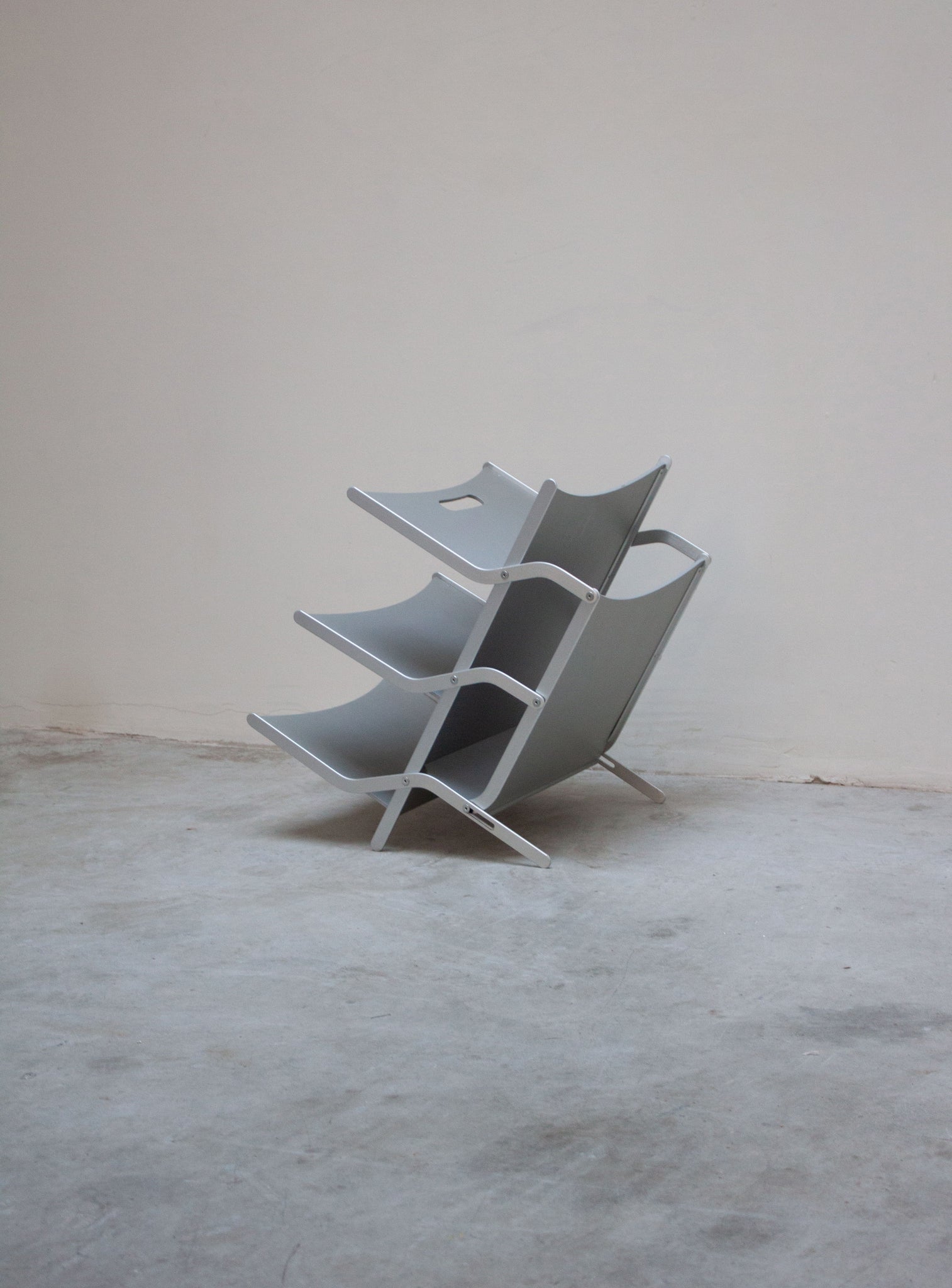 YCAMI Press Folding Magazine Rack by Raul Barbieri (Silver)