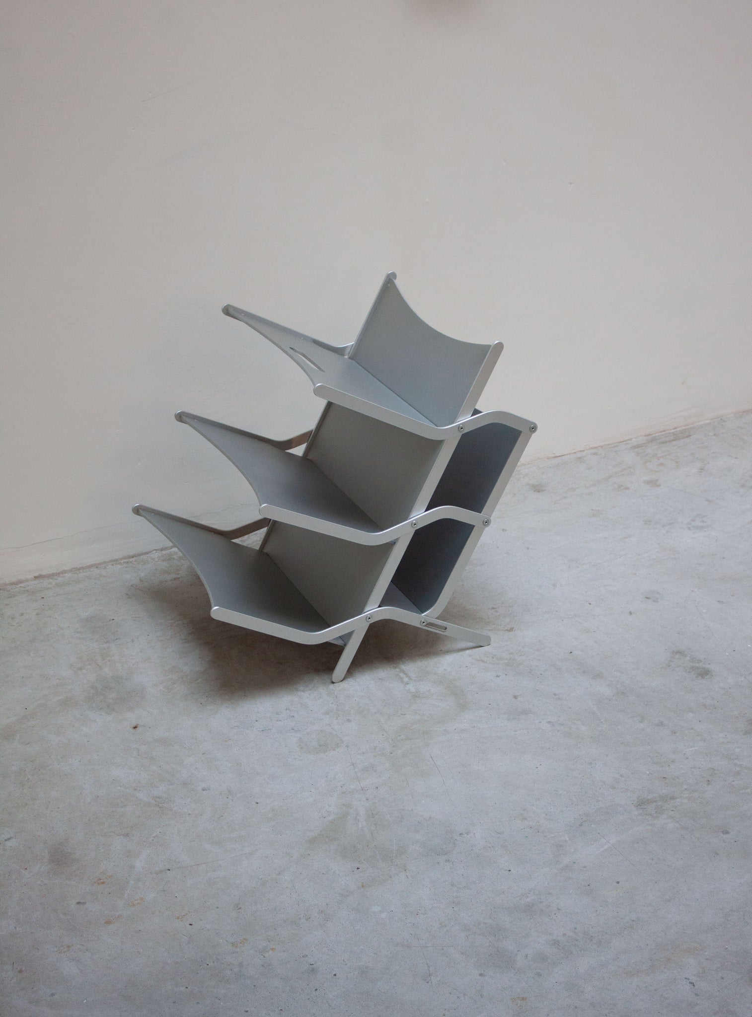 YCAMI Press Folding Magazine Rack by Raul Barbieri (Silver)