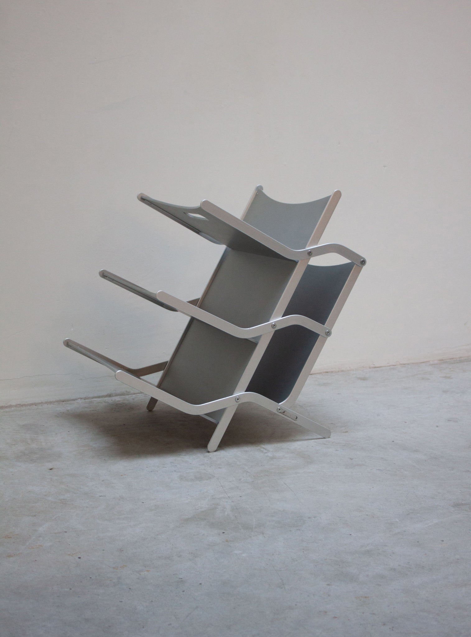 YCAMI Press Folding Magazine Rack by Raul Barbieri (Silver)