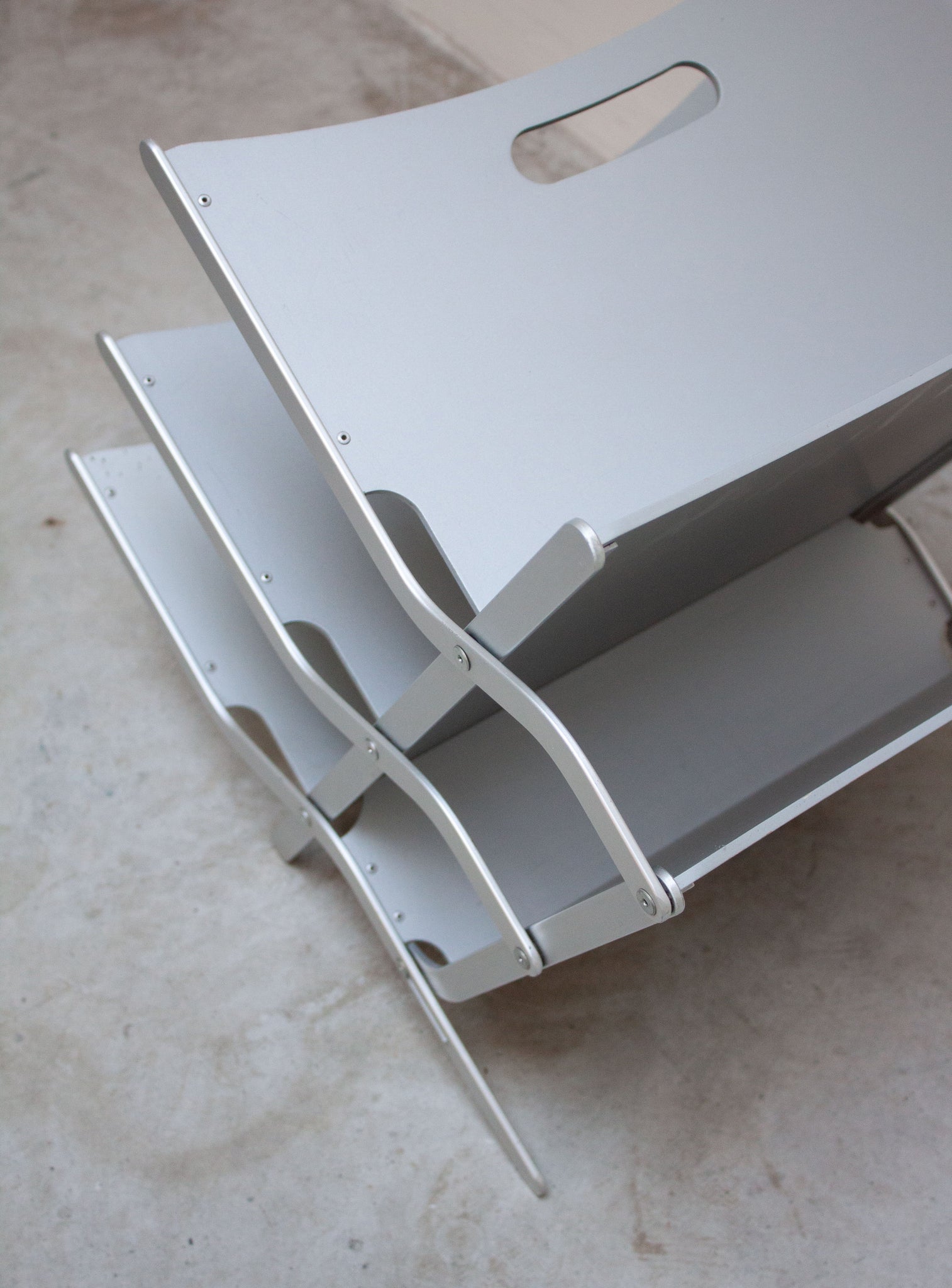 YCAMI Press Folding Magazine Rack by Raul Barbieri (Silver)