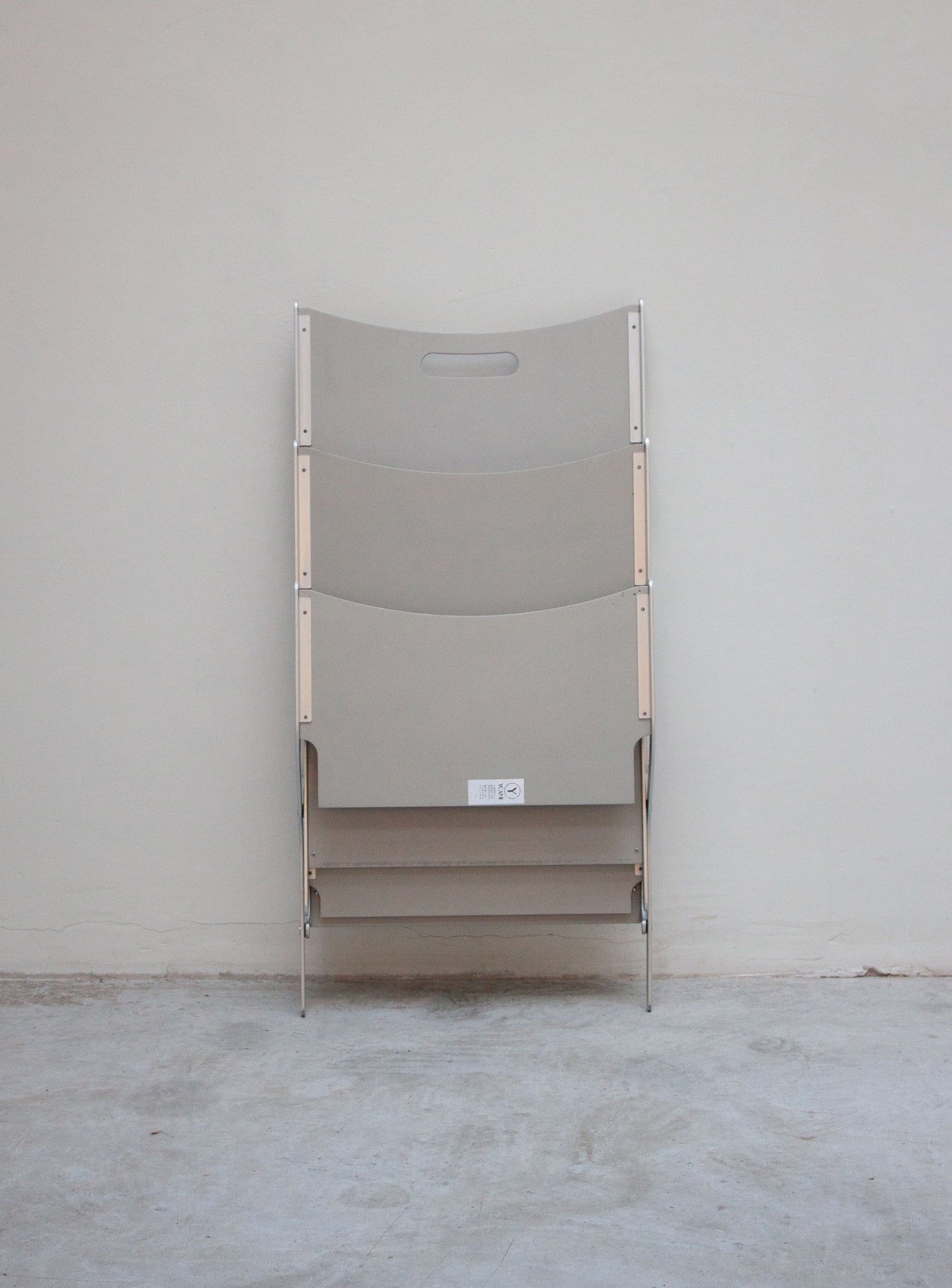 YCAMI Press Folding Magazine Rack by Raul Barbieri (Silver)