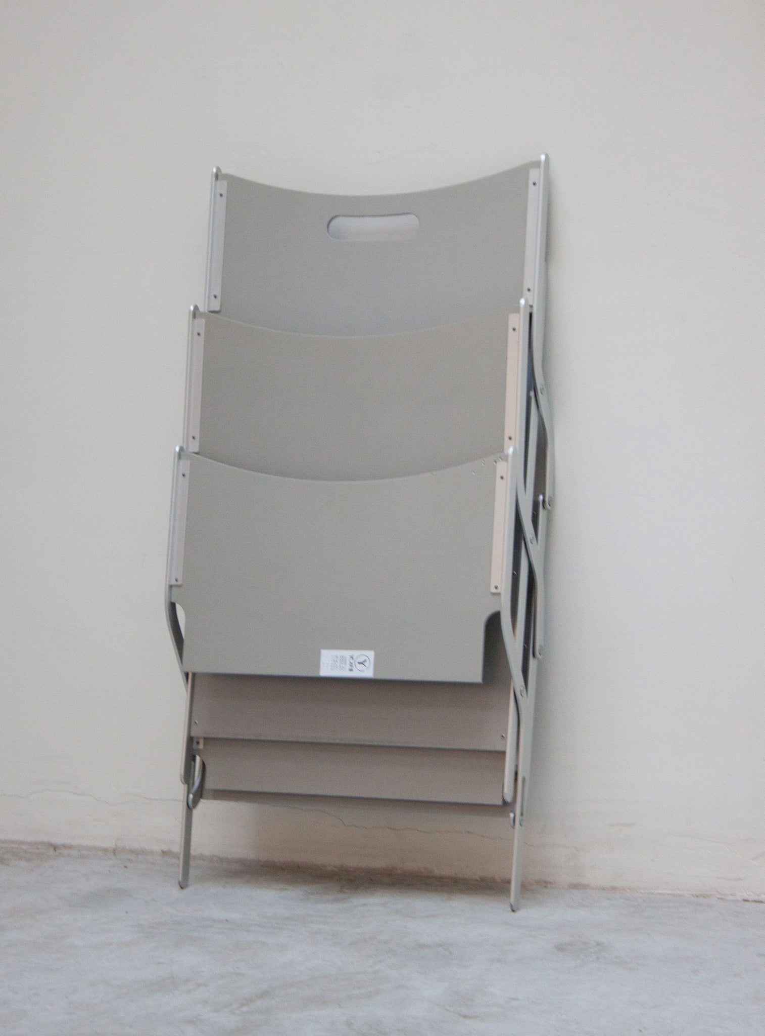 YCAMI Press Folding Magazine Rack by Raul Barbieri (Silver)