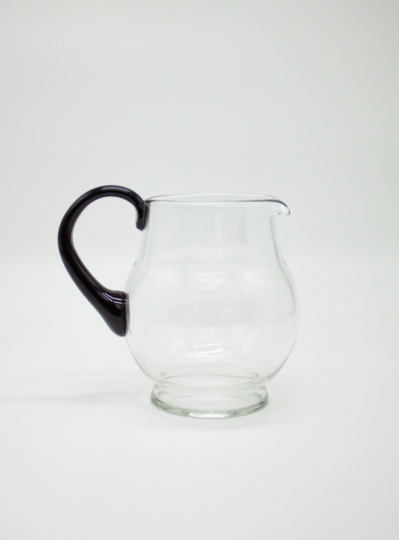 Glass Pitcher with Black Handle